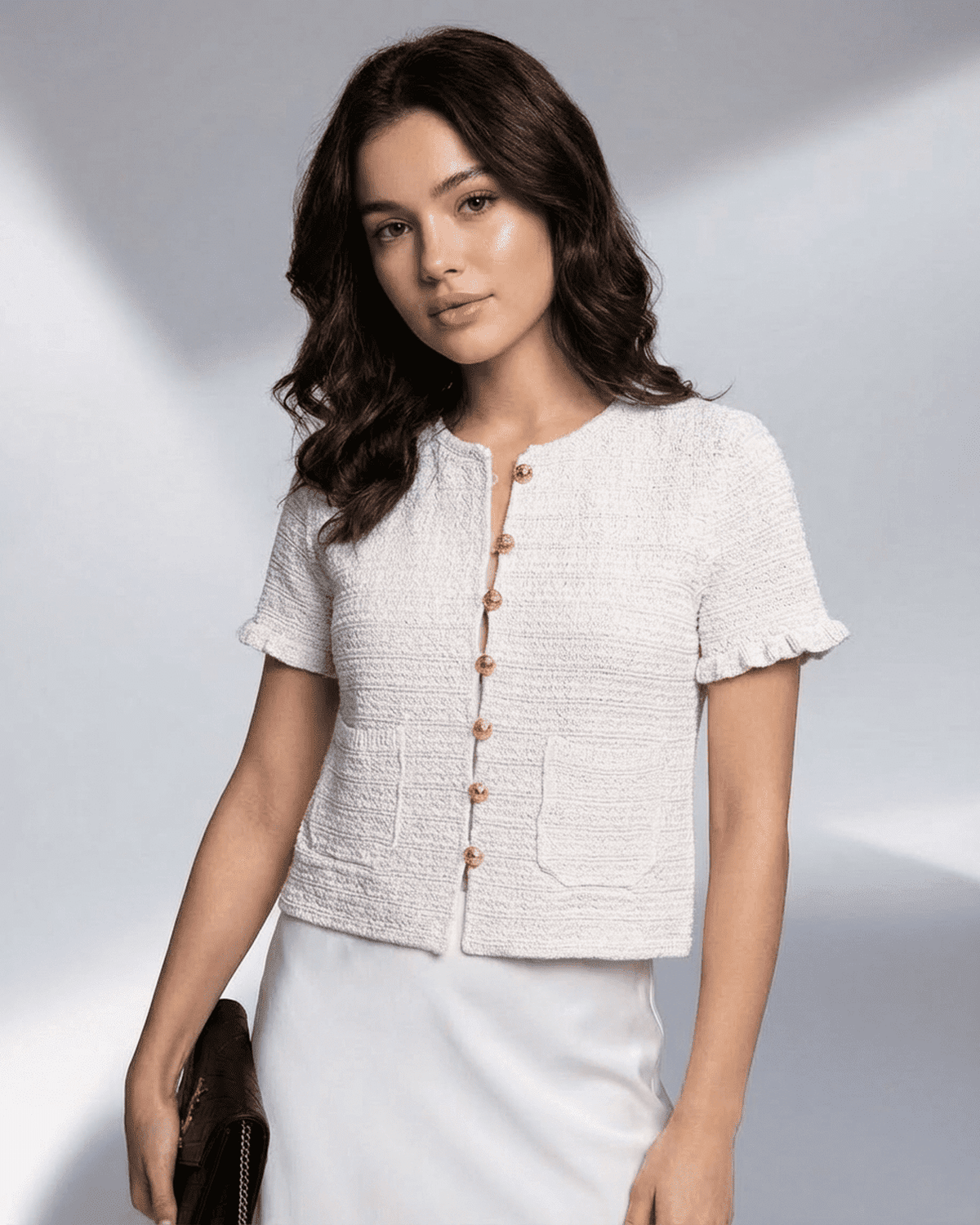 Luna Cardigan by Lauven – Short sleeve button knitwear with structured silhouette and O-neck collar.