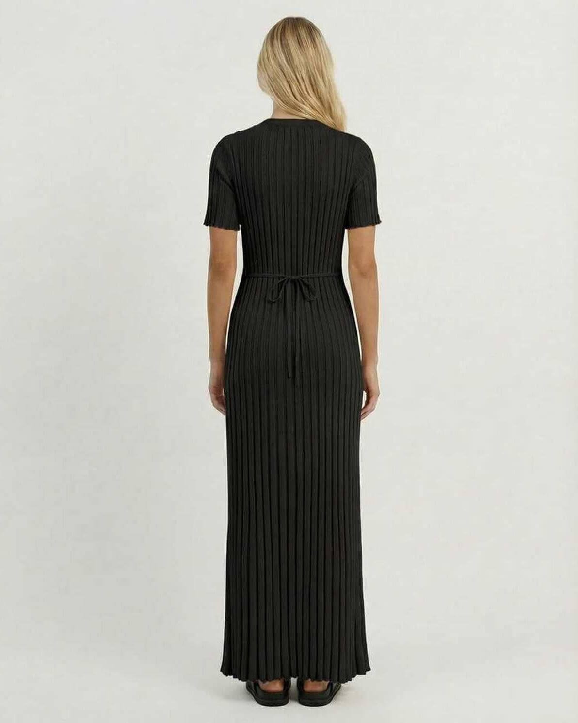 Luna Maxi Dress by Lauven, back view showcasing elegant black ribbed knit fabric and fitted silhouette.