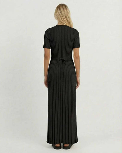Luna Maxi Dress by Lauven, back view showcasing elegant black ribbed knit fabric and fitted silhouette.