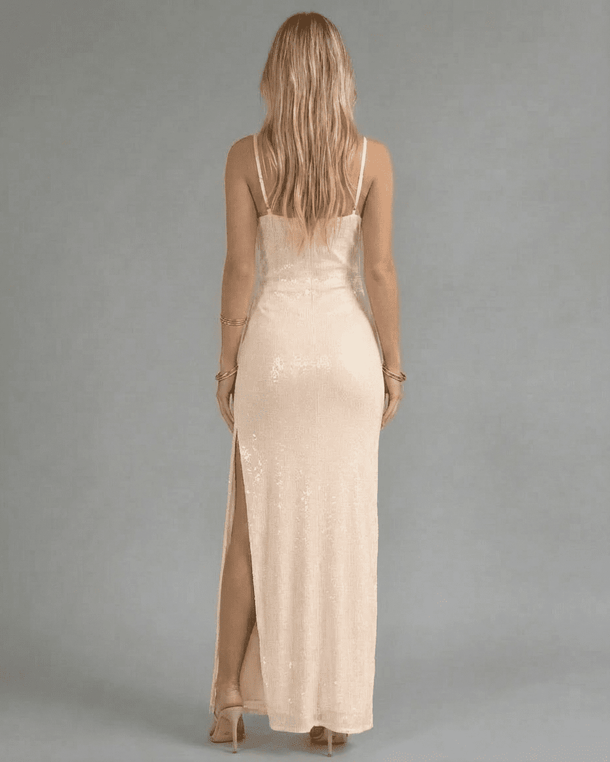 Luna Maxi Dress by Lauven, a stunning champagne sequin gown with slit detail, showcasing an elegant back view.