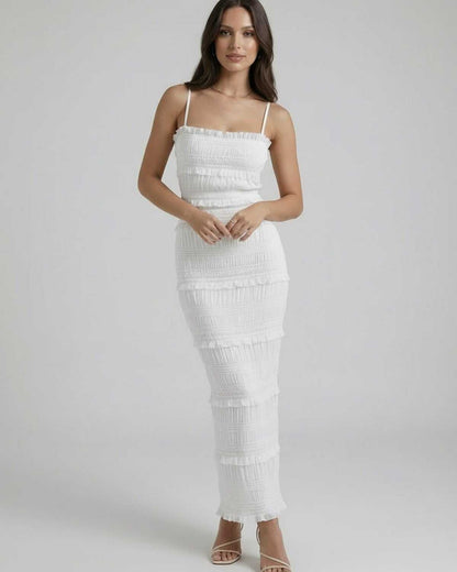 Lauven Luna Maxi Dress – Sleek sheath silhouette in crisp white with delicate spaghetti straps and pleating details.