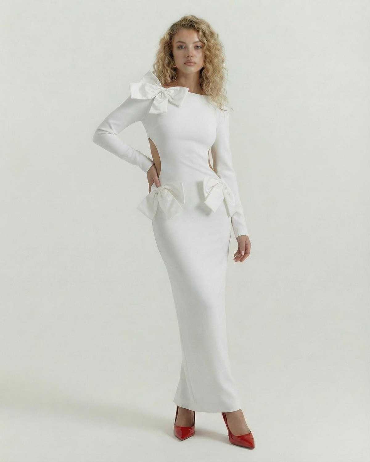Luna Maxi Dress by Lauven featuring a white silhouette with open back and bow accents, perfect for elegant occasions.