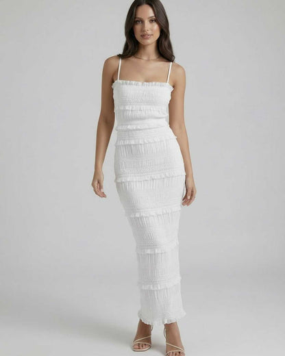 Lauven Luna Maxi Dress showcasing a sleek sheath silhouette in crisp white with spaghetti straps and textured details.