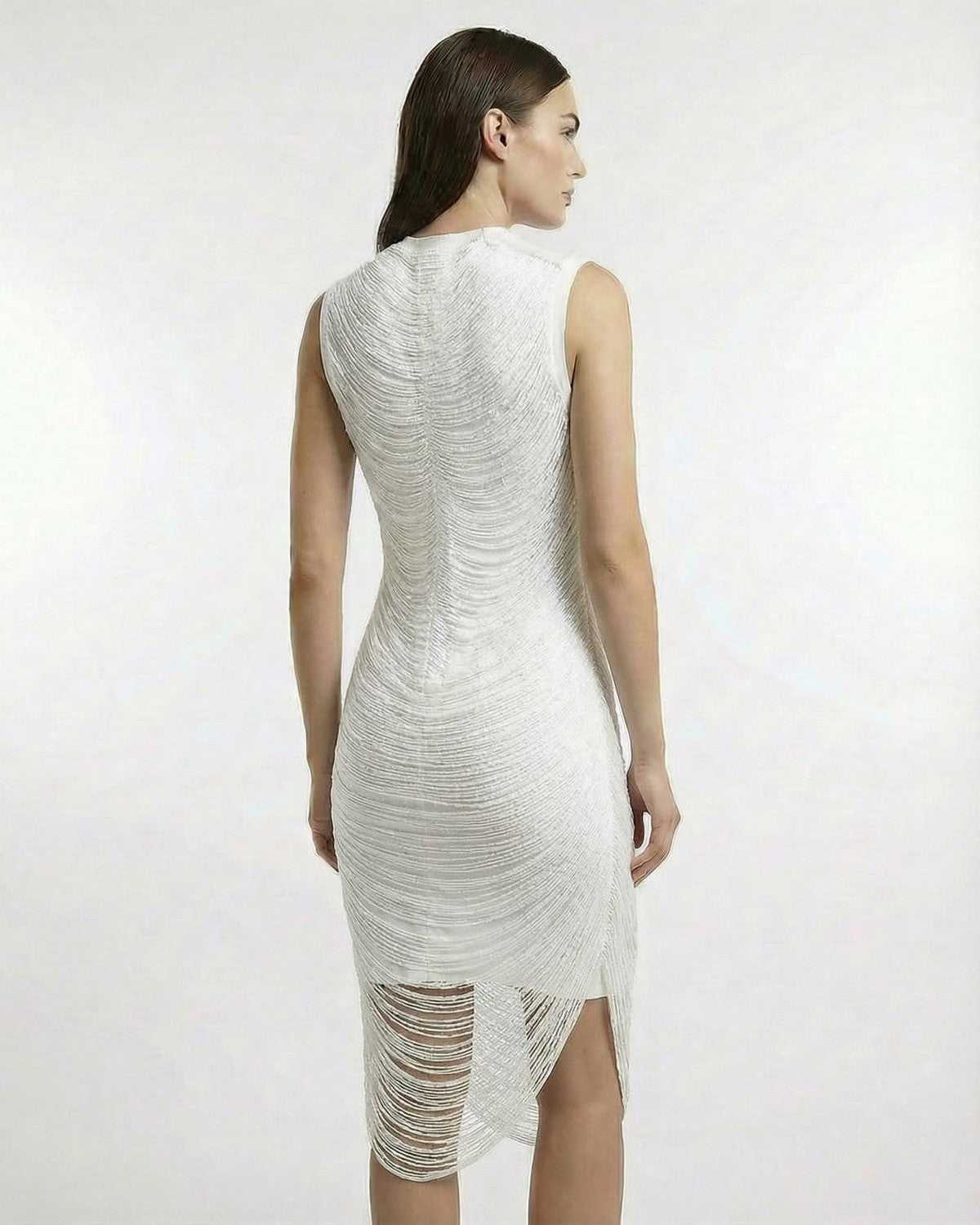 Luna Midi Dress by Lauven showcasing refined bodycon elegance with luminous texture and soft movement from the back view.