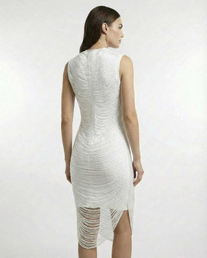 Luna Midi Dress by Lauven showcasing refined bodycon elegance with luminous texture and soft movement from the back view.