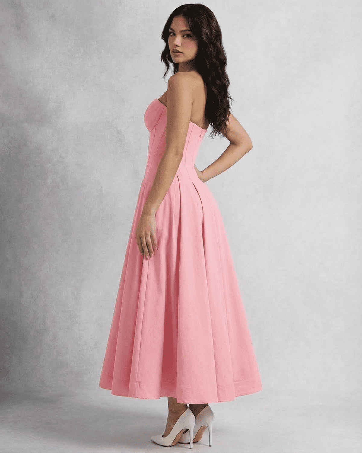 Luna Midi Dress by Lauven, strapless pink corset A-line dress showcasing elegance and flowing silhouette.
