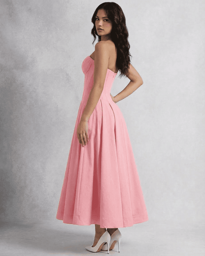 Luna Midi Dress by Lauven, strapless pink corset A-line dress showcasing elegance and flowing silhouette.