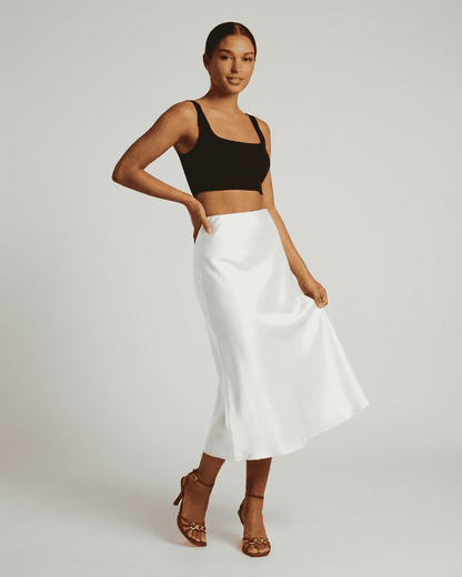 Luna Midi Skirt from Lauven, elegant satin mermaid midi skirt in white, showcasing a refined silhouette.