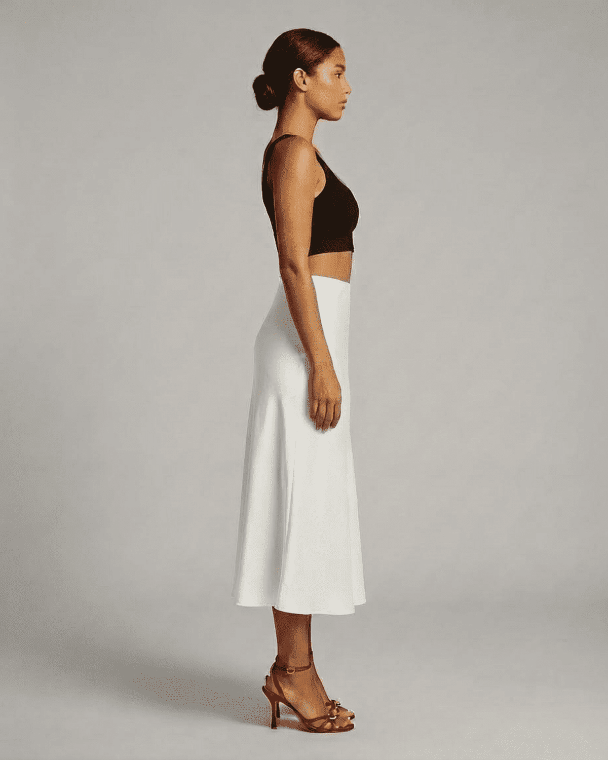 Luna Midi Skirt by Lauven, elegant satin mermaid midi skirt in white, showcasing a refined silhouette and soft flow.