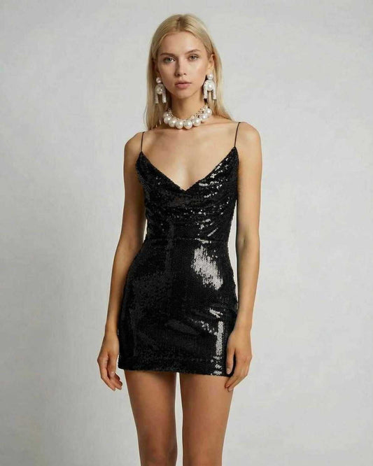 Luna Mini Dress by Lauven, featuring elegant black sequin fabric and a flattering silhouette for evening events.