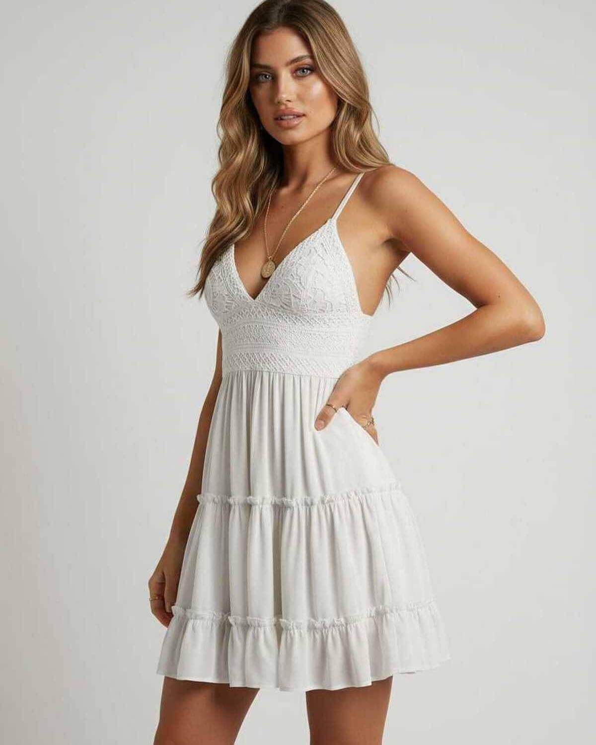 Luna Mini Dress by Lauven featuring a delicate lace bodice and flowy tiered skirt, perfect for warm weather events.