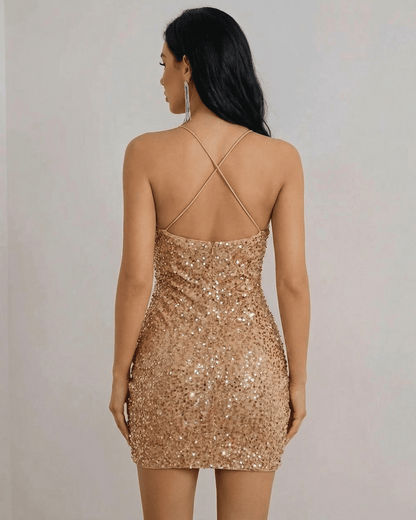 Luna Mini Dress by Lauven, showcasing a gold sequin halter neck design with a flattering fit from the back view.