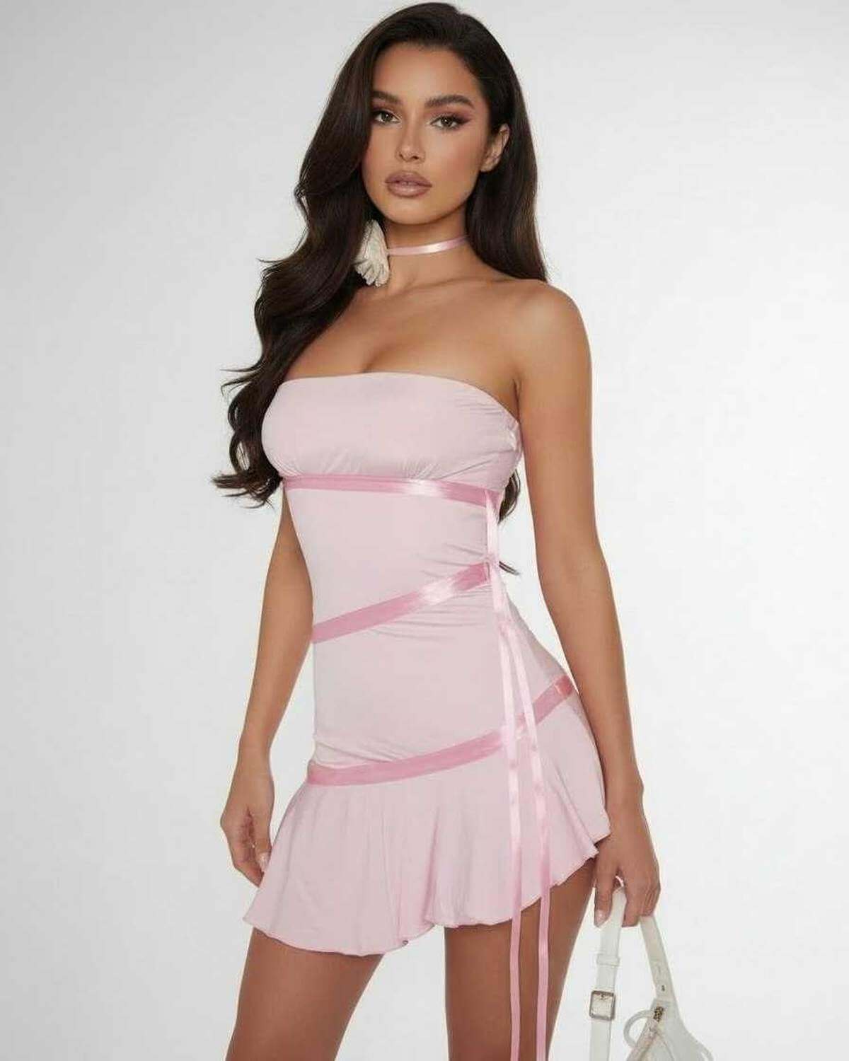 Lauven Luna Mini Dress in light pink with satin ribbon detailing and strapless bandeau neckline.