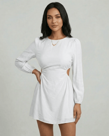 Lauven Luna Mini Dress showcasing a long sleeve A-line design with side cut-out detail in bright white.