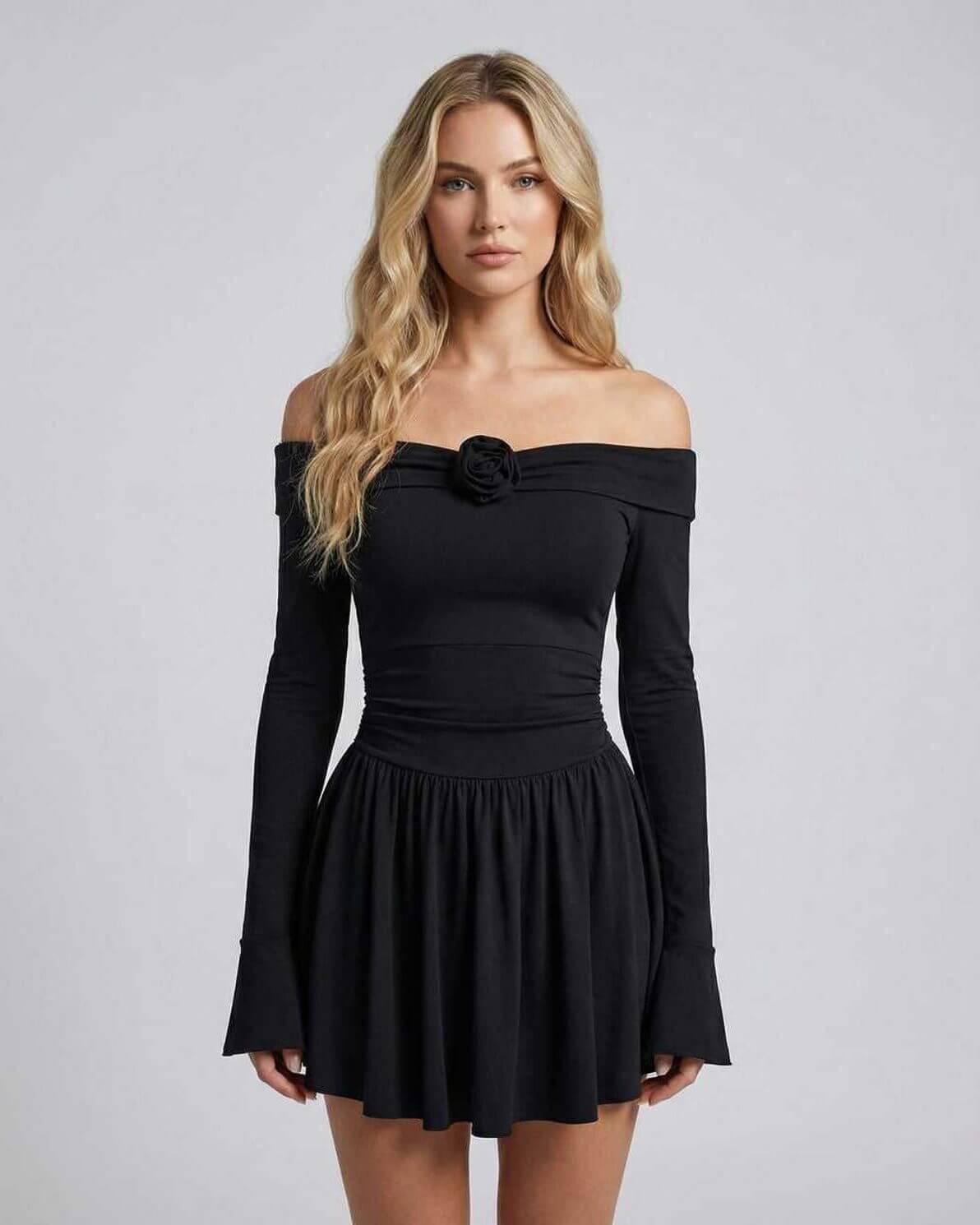 Luna Mini Dress by Lauven featuring off-shoulder floral detail and flattering silhouette in black.
