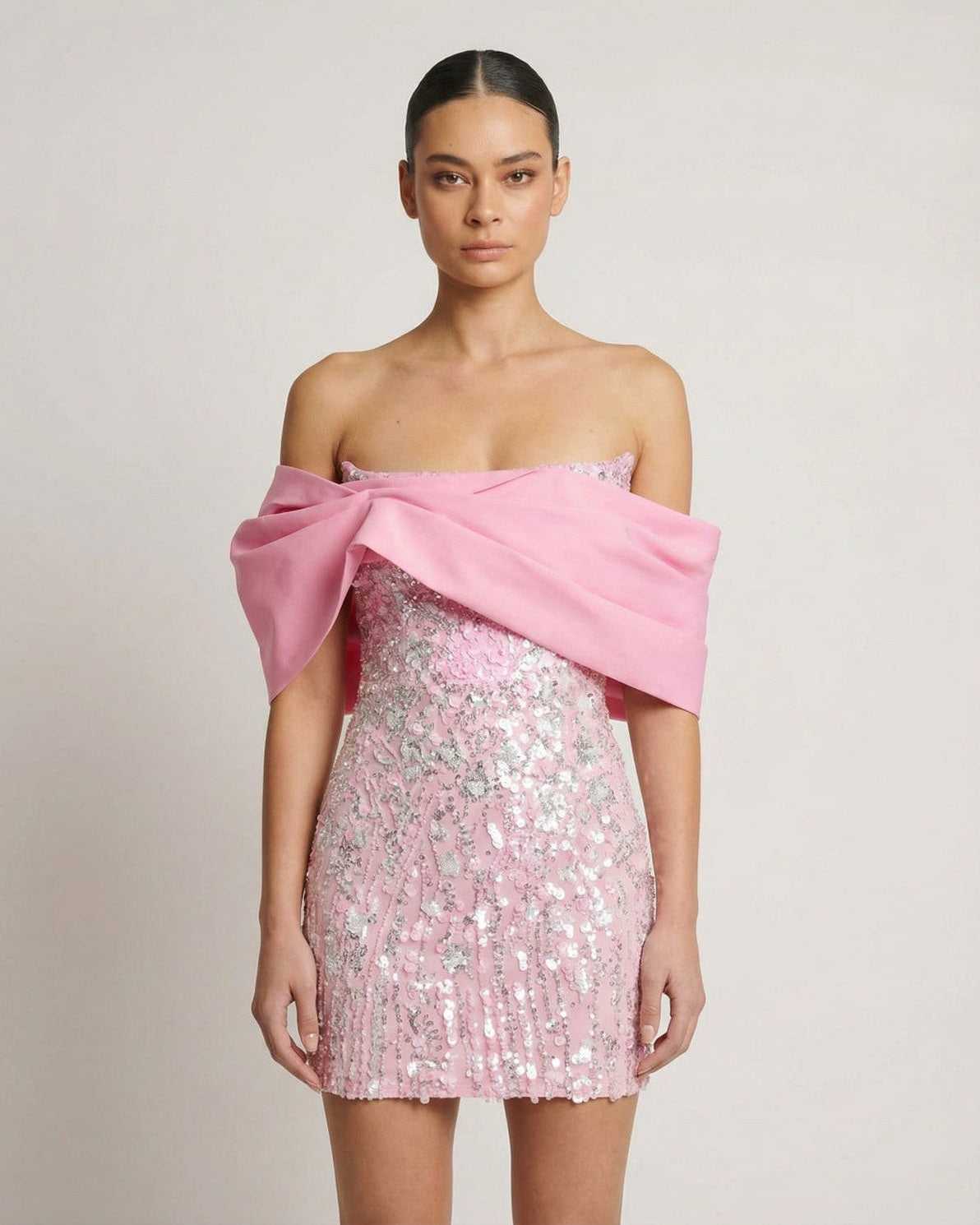 Luna Mini Dress by Lauven: pink sequin strapless party dress with elegant off-the-shoulder detail.