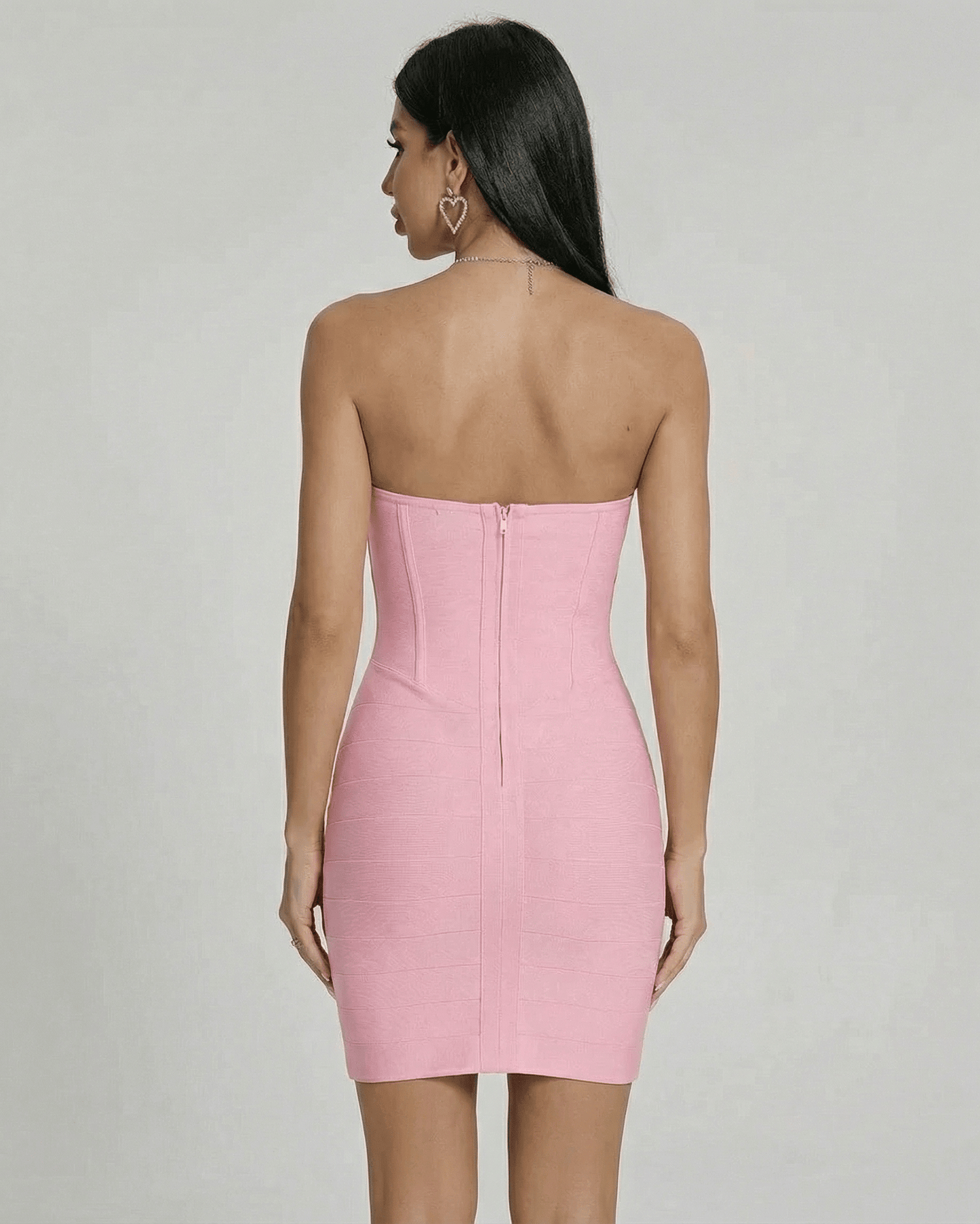 Back view of the Luna Mini Dress by Lauven, showcasing its sleek strapless design and fitted silhouette.