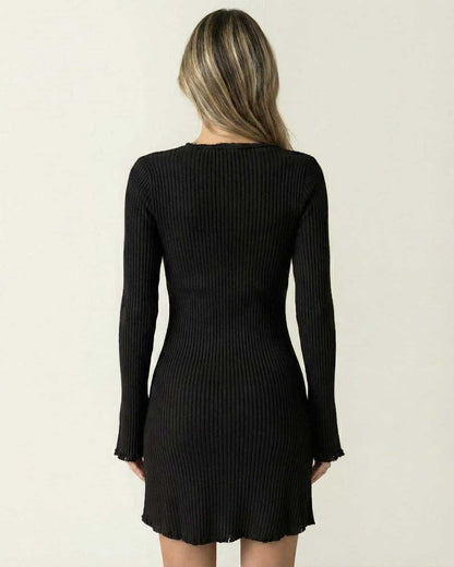 Luna Mini Dress by Lauven, showcasing the back view of a sleek black ribbed bodycon design with long flared sleeves.