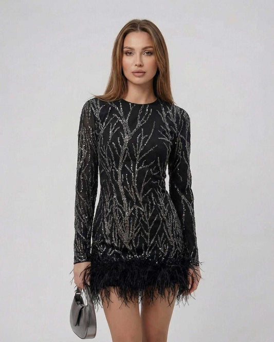 Luna Mini Dress by Lauven featuring sequin detailing and feather hem, perfect for evening events.