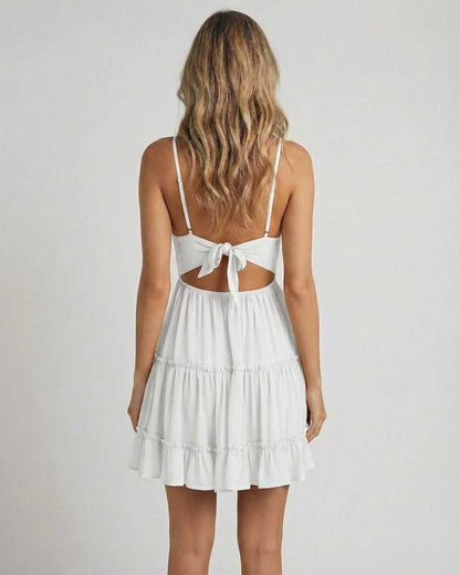 Luna Mini Dress by Lauven, showcasing a back view with an elegant lace bodice and flowy tiered skirt.