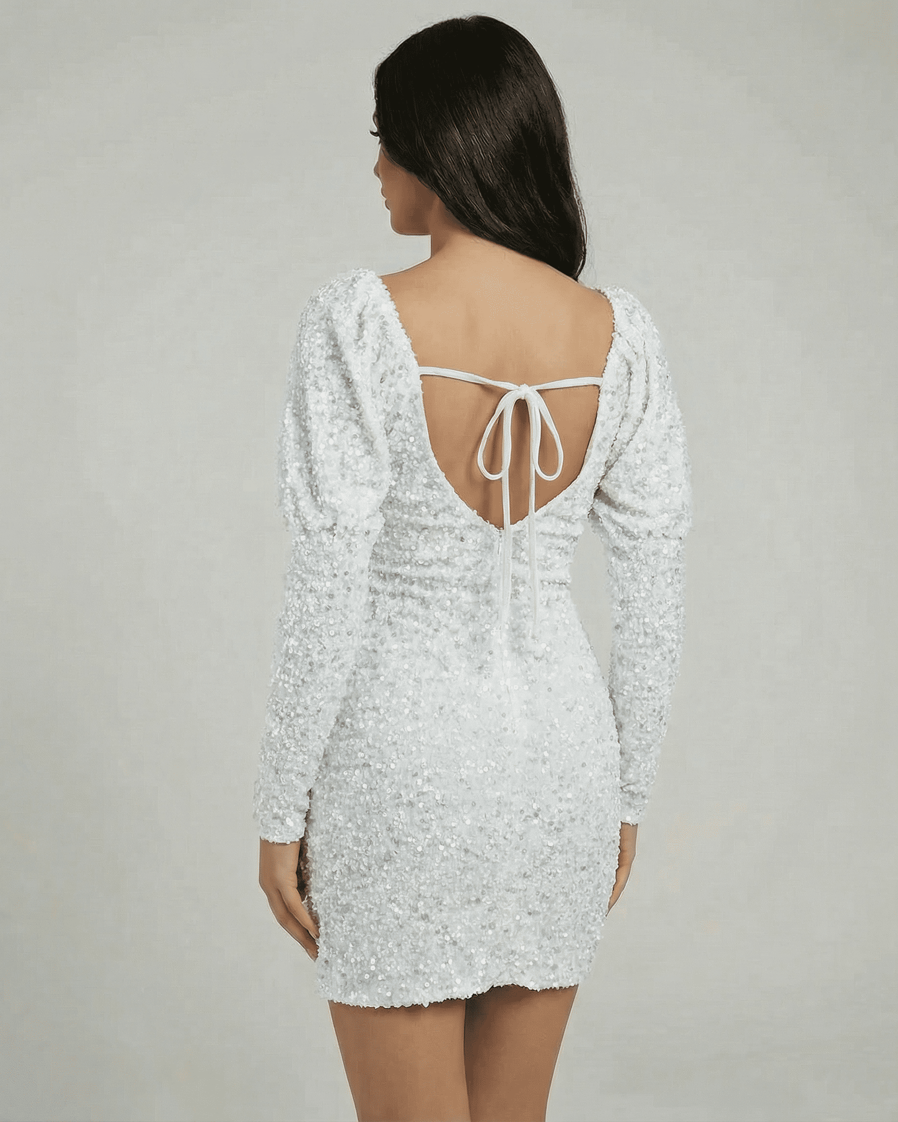 Luna Mini Dress by Lauven featuring a white sequin sheath and open back design.