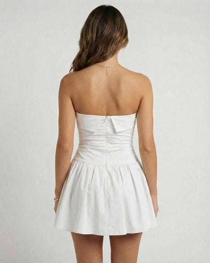 Lauven Luna Mini Dress back view, classic white strapless A-line silhouette, perfect for summer occasions.