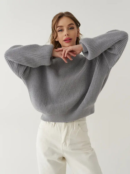 Luna Sweater by Lauven, oversized knit in light grey, showcasing relaxed silhouette and modern elegance.