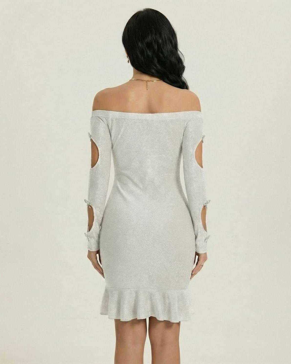 Lauven Lunar Mini Dress showing the back view with off-the-shoulder design, stylish cutouts, and ruffled hemline.