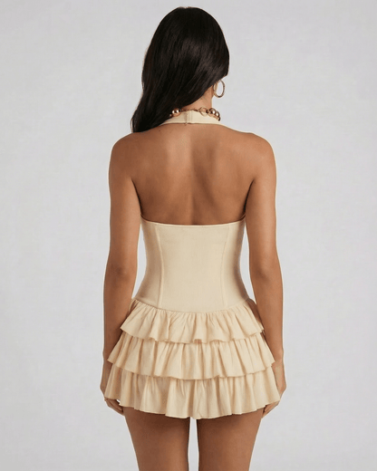Lunara Mini Dress by Lauven, showcasing a tiered beige design with a square neck and halter cut from the back.
