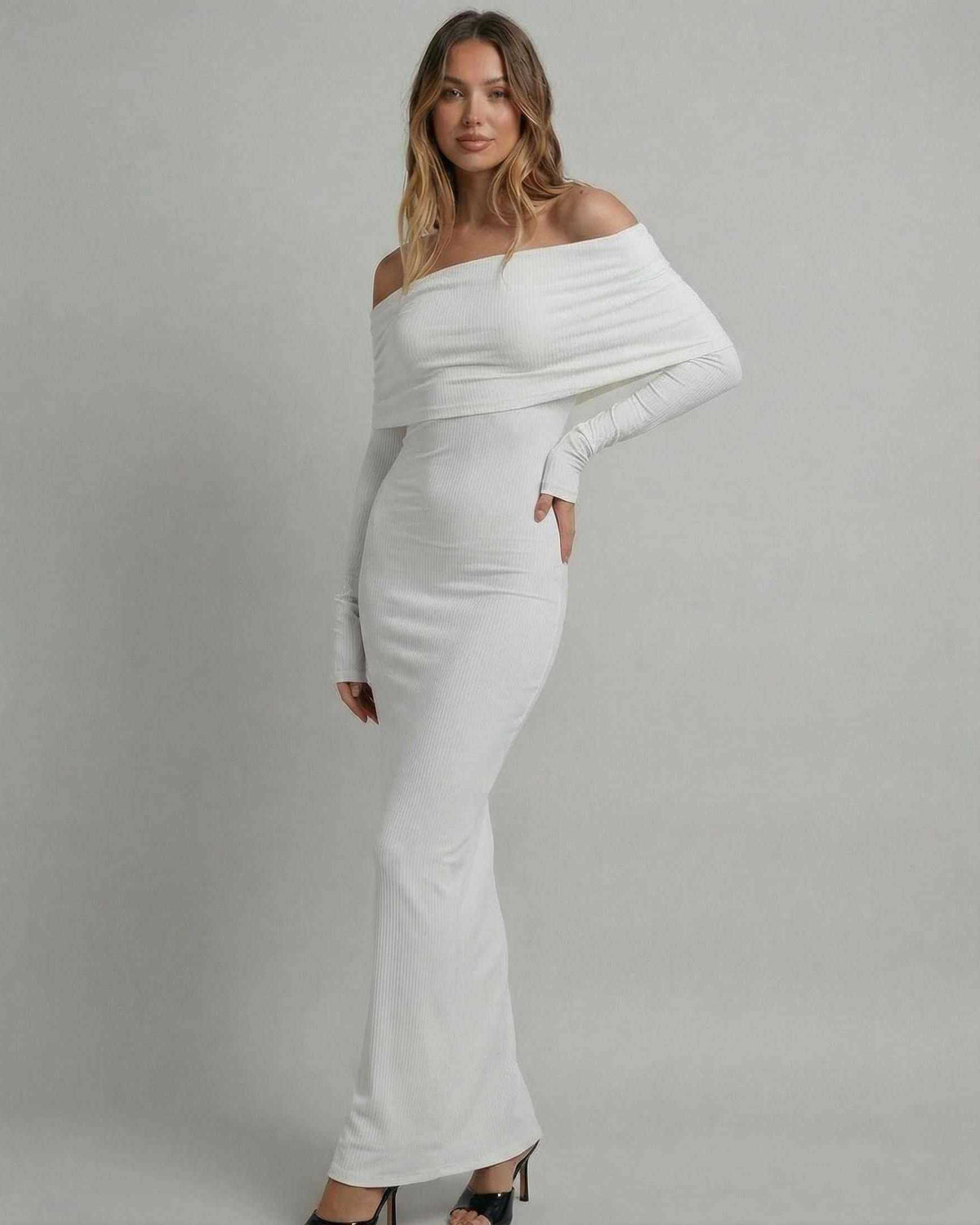 Elegant model wearing the Lunaria Maxi Dress by Lauven, off-shoulder long sleeve, sleek white design.