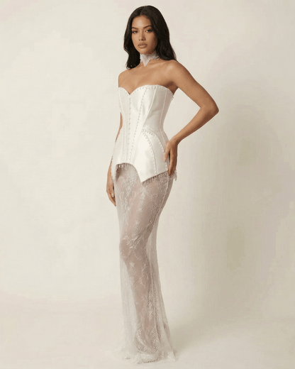 Lunaria Maxi Dress by Lauven featuring a strapless corset bodice and lace patchwork skirt.