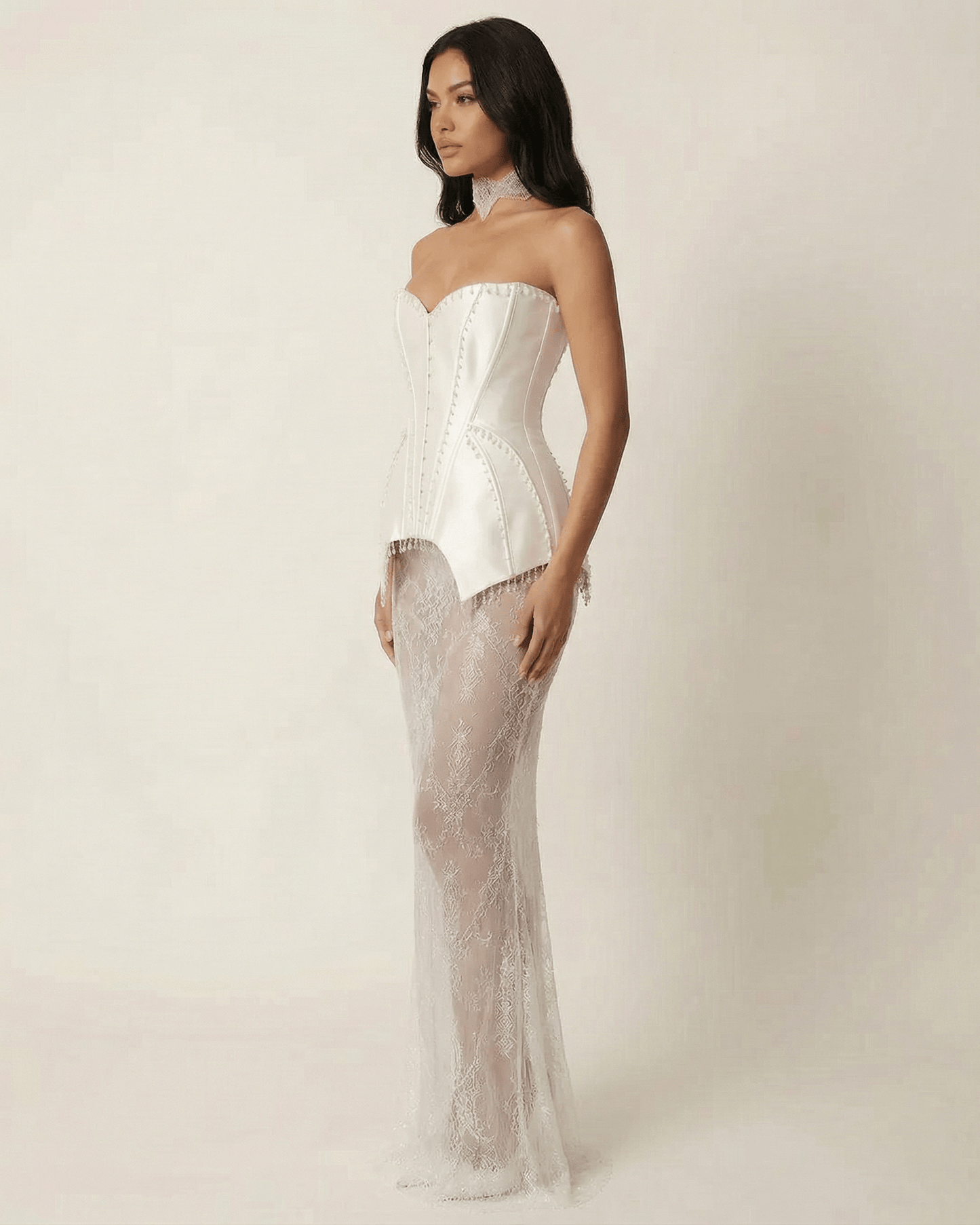 Lunaria Maxi Dress by Lauven features a strapless lace patchwork design with corset-style bodice and sheer skirt.