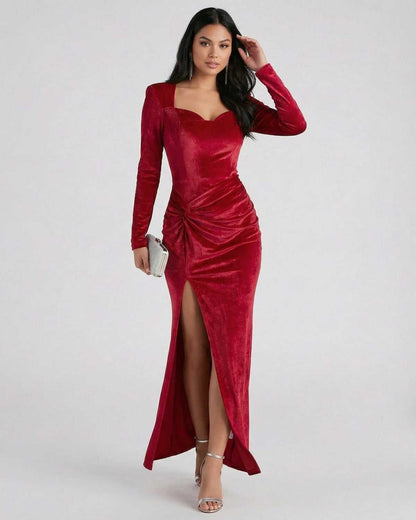 Lauven Lyra Maxi Dress in red velvet, featuring long sleeves, square neckline and high slit for an elegant evening look.
