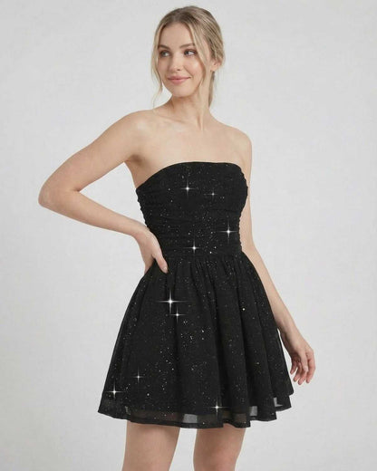 Lyra Mini Dress by Lauven, black strapless A-line mini dress with bow detail and subtle shimmer finish.
