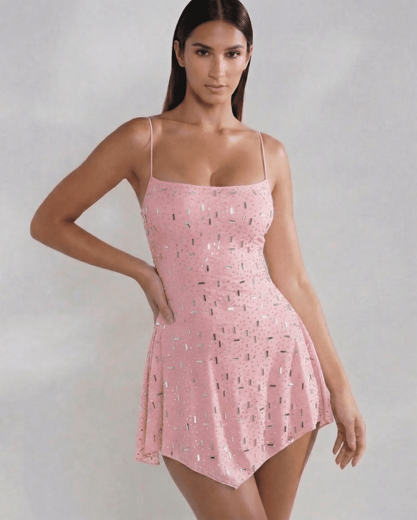 Lyra Mini Dress by Lauven, featuring a square neck, open back, and subtle sparkle in a soft blush tone.