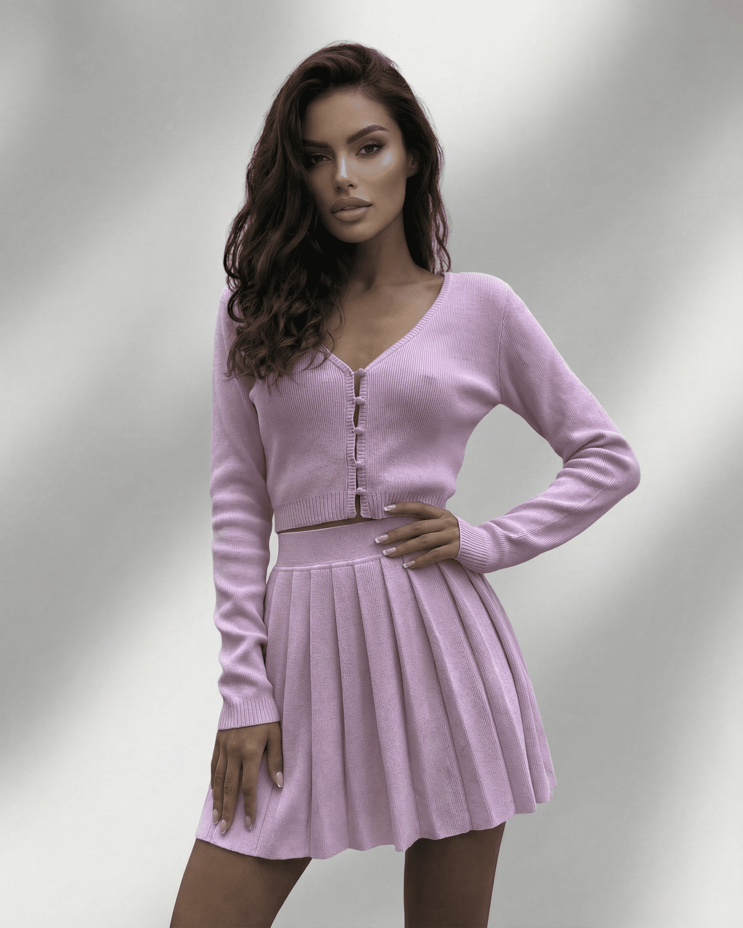 Lyra Two-Piece Set by Lauven, soft knit cardigan and pleated mini skirt in lavender, modern feminine silhouette.