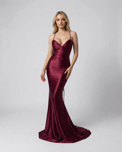 Marcelline Maxi Dress by Lauven - Luxurious burgundy satin evening gown with spaghetti straps and deep V-neckline.