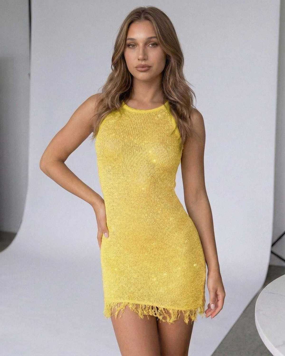 Marigold Mini Dress by Lauven, vibrant yellow sequin sheath dress with frayed hem, perfect for summer style.
