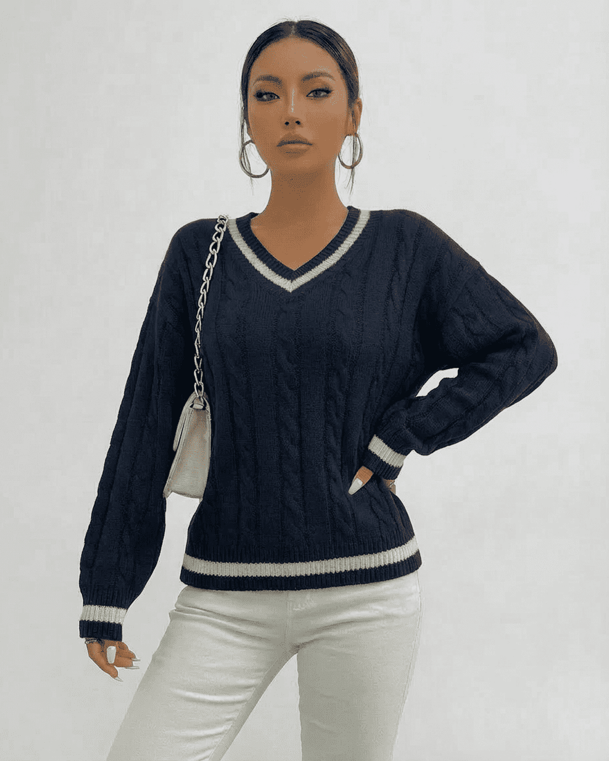 Marina Sweater by Lauven, a cable knit V-neck pullover with refined design and soft acrylic fabric.