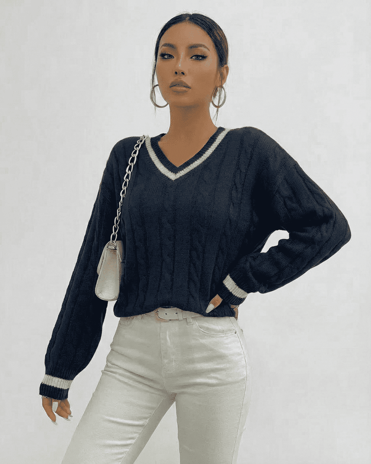 Marina Sweater by Lauven in cable knit, V-neck design, perfect for stylish everyday wear.