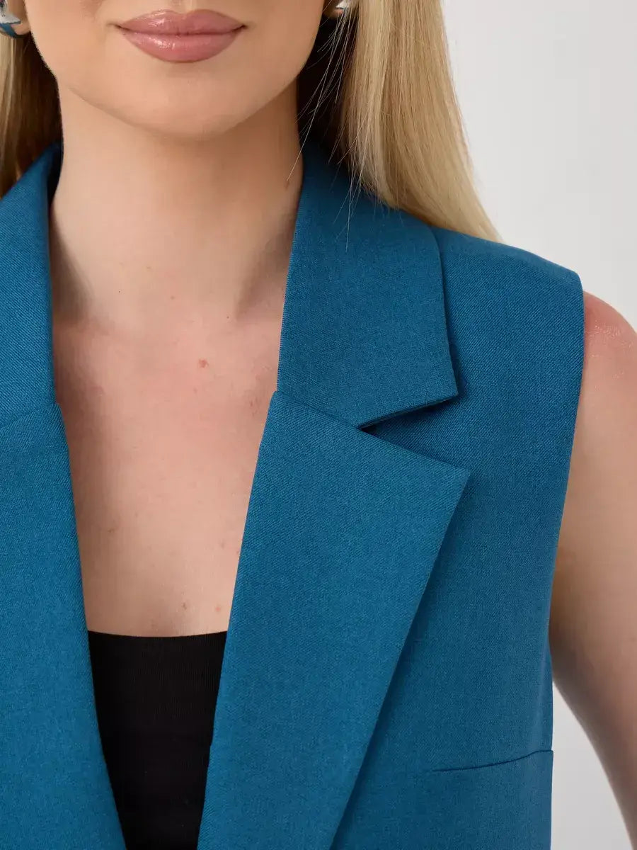 Marine Suit Set by Lauven - close-up of stylish sleeveless teal vest for modern women.