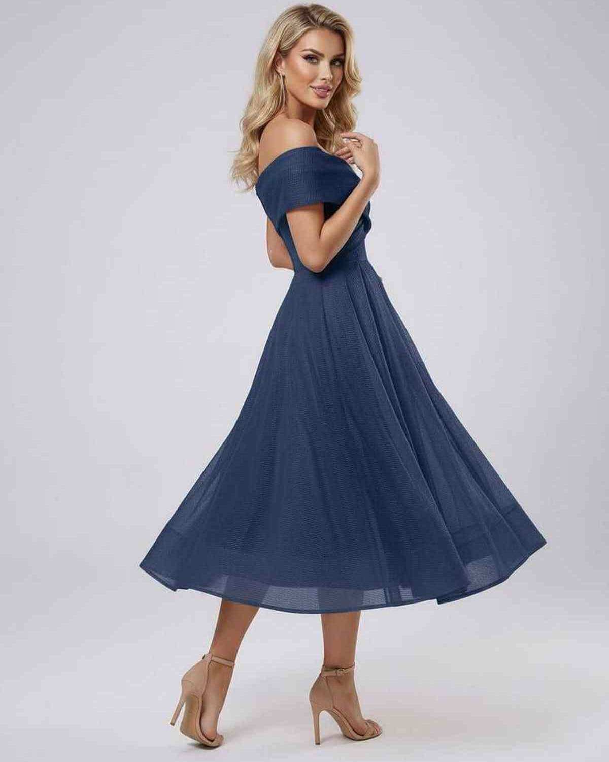 Elegant Maris Midi Dress by Lauven featuring an off shoulder design and flowing skirt, perfect for evening events.