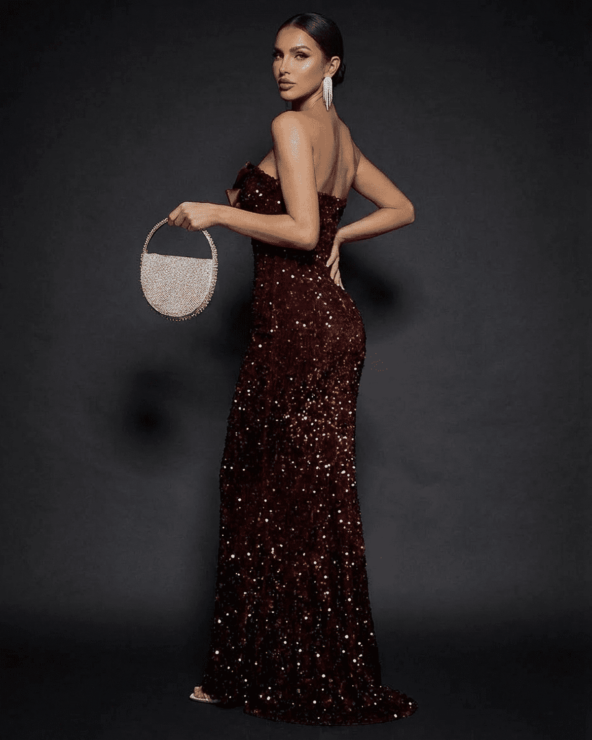 Marquise Maxi Dress by Lauven, a stunning strapless sequined maxi dress with a dramatic thigh-high slit.
