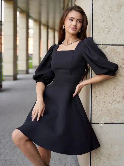 Lauven Midnight Grace Black Mini Dress with puff sleeves and square neck, perfect for elegant occasions.