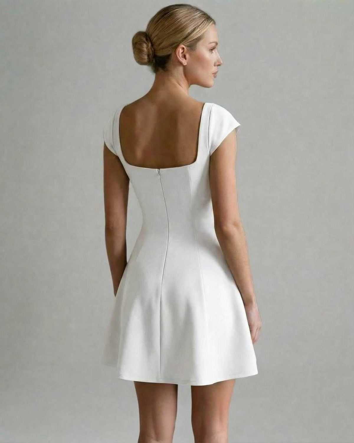 Milano Mini Dress by Lauven, refined panelled mini dress with short sleeves and a polished silhouette.