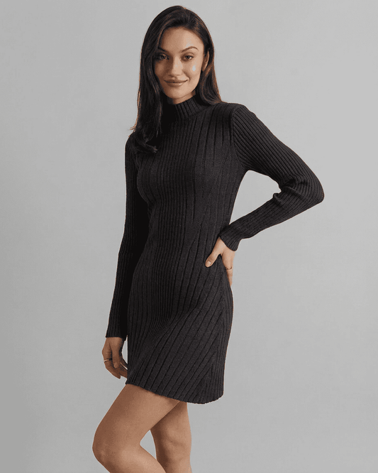 Model showcasing the Milano Mini Dress by Lauven, featuring a ribbed knit, mock neck, and long sleeves.
