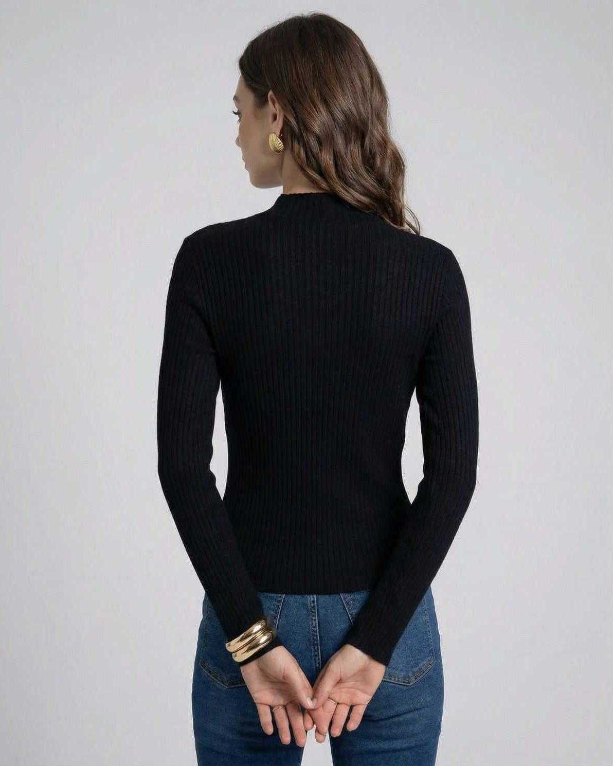 Back view of a woman wearing the Milano Pullover by Lauven, featuring a rib-knit texture and long sleeves.