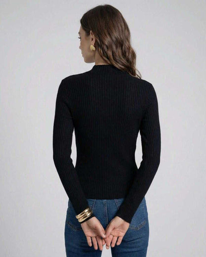 Back view of a woman wearing the Milano Pullover by Lauven, featuring a rib-knit texture and long sleeves.