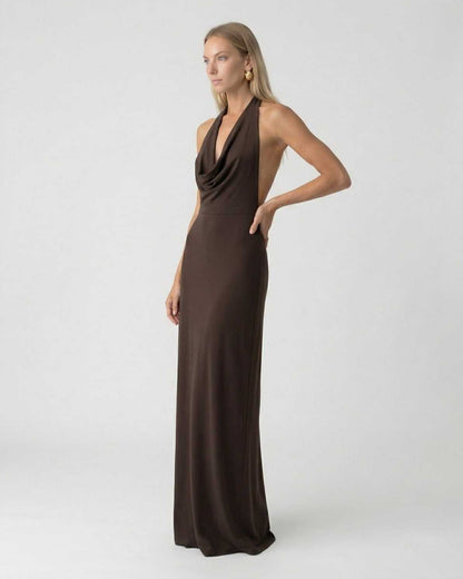 Model showcasing the Lauven Mocha Maxi Dress, a halter neck slip dress with an elegant open back design.