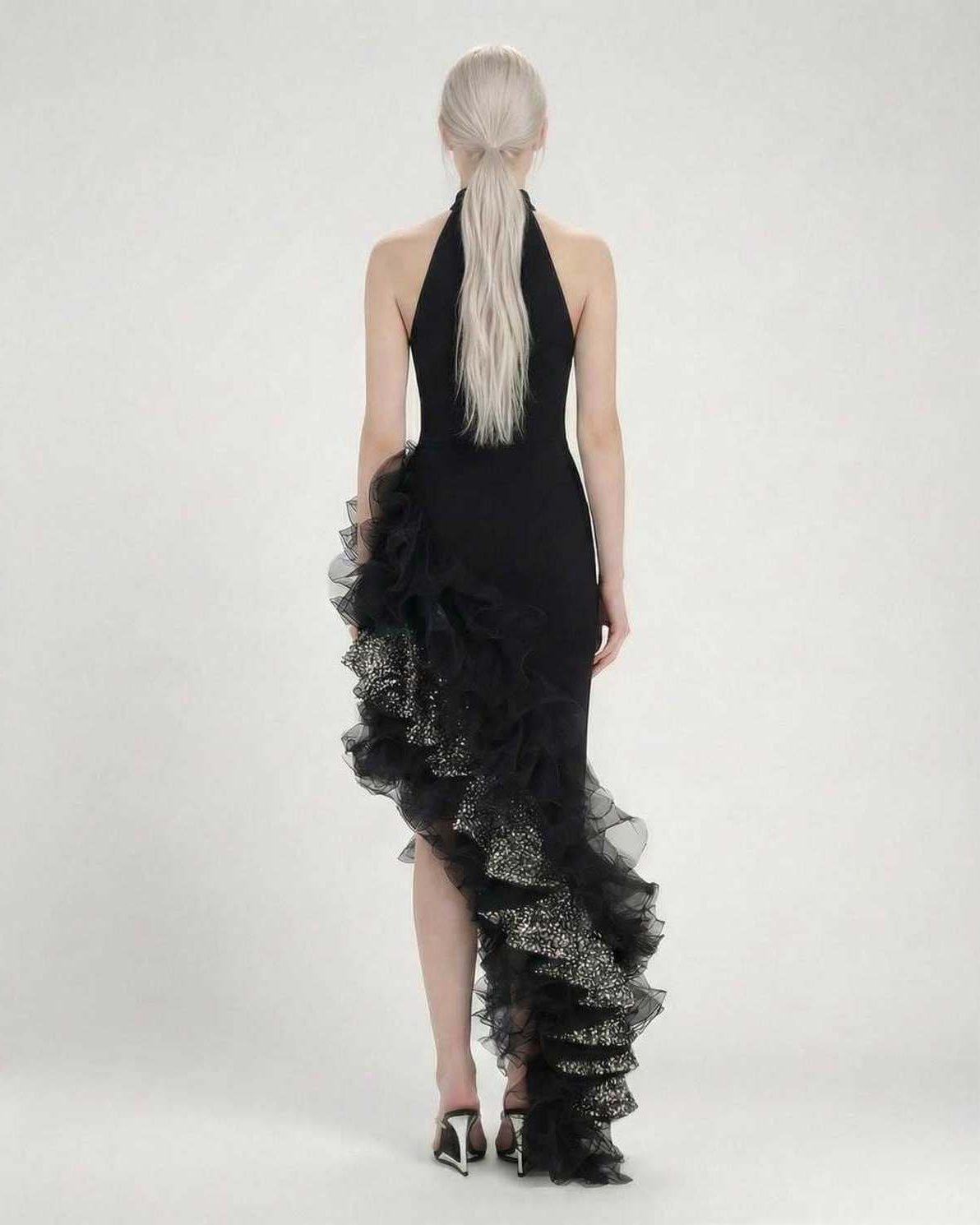 Monaco Maxi Dress by Lauven, black halter neck dress with asymmetrical ruffle detailing from the back.